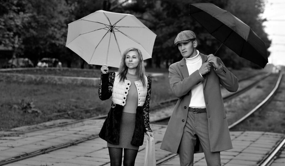 pair, lovers, street, city, railways, love story, a meeting, autumn, umbrella, together, man and woman, boy and girl, look into the distance, under the umbrella, point out, look out for, wait for the train, expectation, passengers, black and white, monochrome, bw
