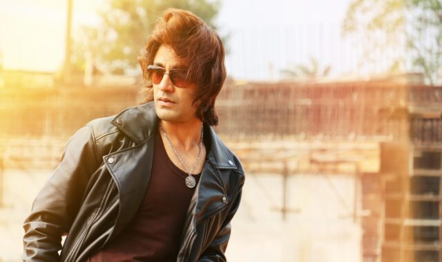 man model, sunglasses, male fashion, attractive youth, blonde and beautiful, action attitude, elegant long hairstyles, street style, macho, desirable hot, commercial perfume concept, hot sexy indian man, long haired guy, isolated town, men wearing leather jacket, cool life, powerful gaze, stylish, charming, urban men fashion, action style, glamorous, men in sunshine, leather blazer, sunlight leak